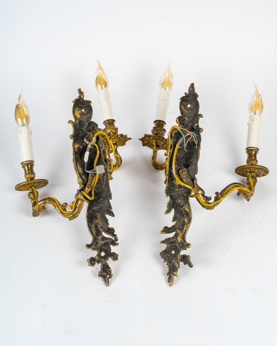 Paar Wandleuchten, genannt Aux Zéphyrs, aus ziselierter und vergoldeter Bronze XIX.