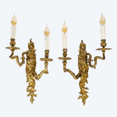 Paar Wandleuchten, genannt Aux Zéphyrs, aus ziselierter und vergoldeter Bronze XIX.