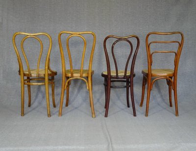 Set of 4 Bistrot 3/4 chairs from 1910 with cane seats Thonet / Kohn