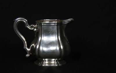 Served in solid silver tea, coffee and sugar pot