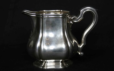 Served in solid silver tea, coffee and sugar pot