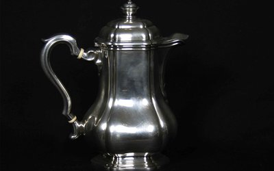 Served in solid silver tea, coffee and sugar pot