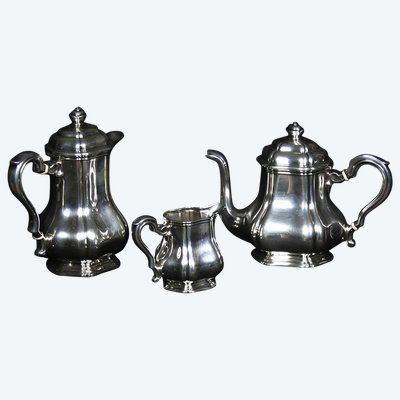 Served in solid silver tea, coffee and sugar pot