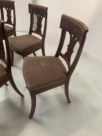 Suite of seven solid mahogany chairs XIX century
