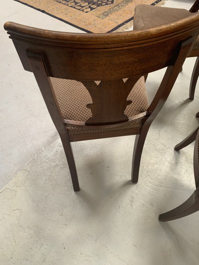 Suite of seven solid mahogany chairs XIX century