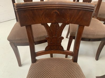 Suite of seven solid mahogany chairs XIX century
