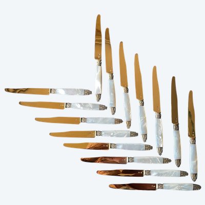 15 mother-of-pearl and vermeil fruit knives.
