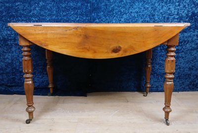 Louis Philippe period flap table in walnut circa 1830