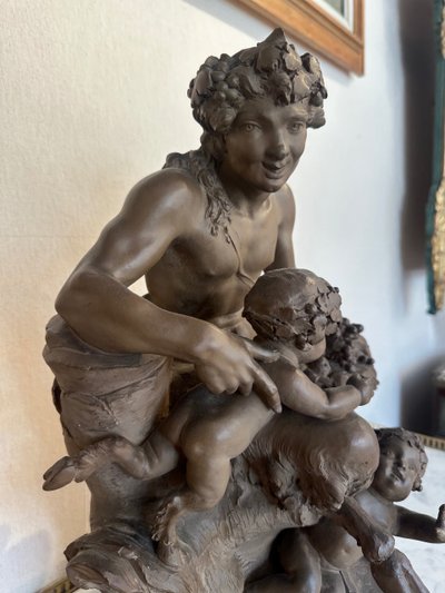 Terre Cuite By Clodion Representing A Faun Surrounded By Puttis
