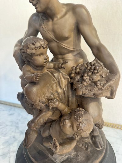 Terre Cuite By Clodion Representing A Faun Surrounded By Puttis