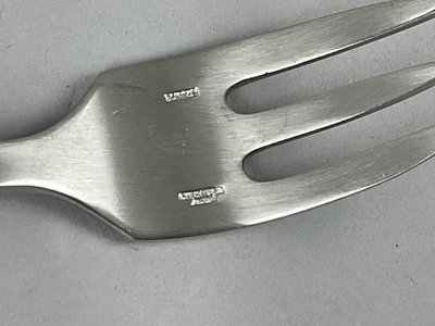 Eight cake forks, steel, Christophe sigma.