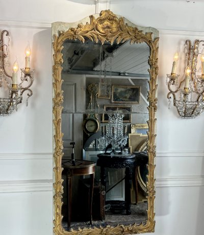 XVIIIth CENTURY MIRROR IN SCULPTTED WOOD WITH 2-PART MERCURY MIRROR