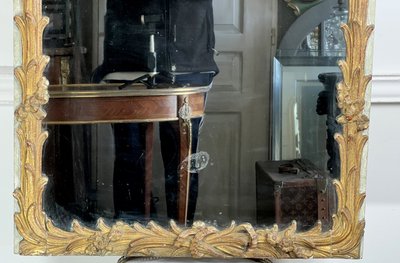 XVIIIth CENTURY MIRROR IN SCULPTTED WOOD WITH 2-PART MERCURY MIRROR