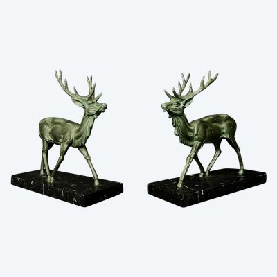 Paire de serre-livres Art Déco – Cerfs en régule à patine vert antique – Socles en marbre noir