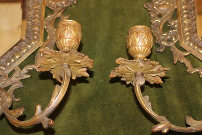 Pair of bronze wall lights with 3 light arms and mirror, Louis XV style, 19th century