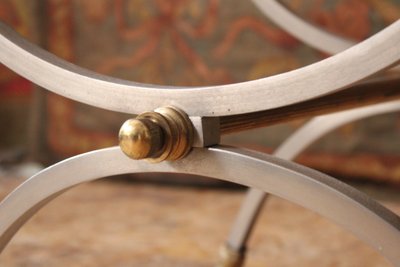 Curule stool seat in polished wrought iron with brass ornamentation, 20th century