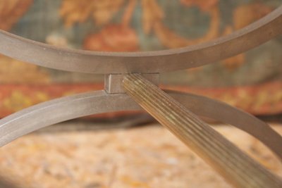 Curule stool seat in polished wrought iron with brass ornamentation, 20th century