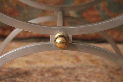 Curule stool seat in polished wrought iron with brass ornamentation, 20th century