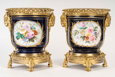 Pair of porcelain and gilt bronze planters, late 19th century