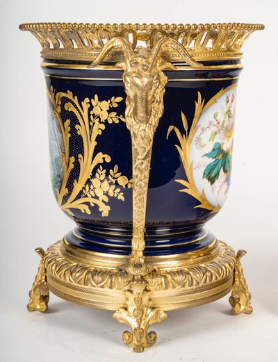 Pair of porcelain and gilt bronze planters, late 19th century