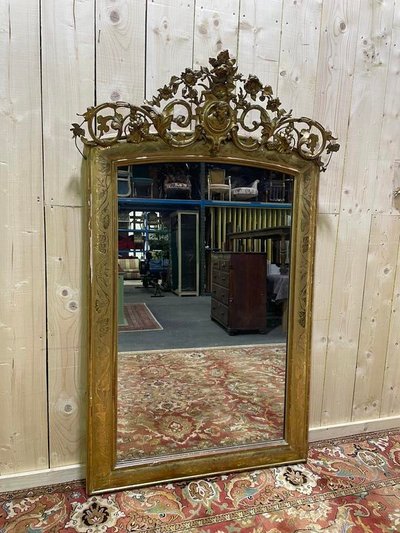 Napoleon III era mirror with a pediment with the gold leaf