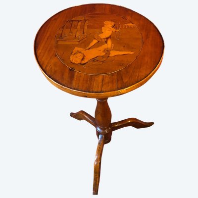Marquetry pedestal table with putti, late 19th century