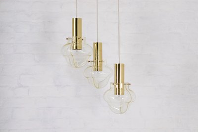Venini amber three-globe pendant light