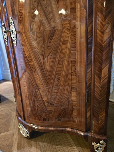 Pair of Regency corner cabinets with support height in violet wood.