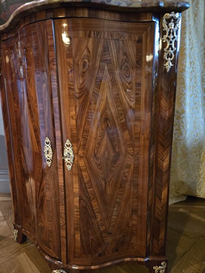 Pair of Regency corner cabinets with support height in violet wood.