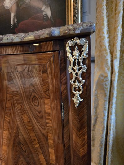 Pair of Regency corner cabinets with support height in violet wood.