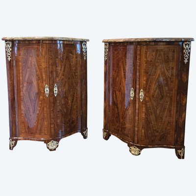 Pair of Regency corner cabinets with support height in violet wood.