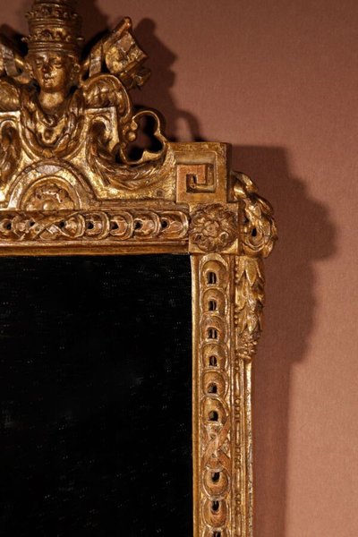 Papal interest: a beautiful mirror decorated with the papal coat of arms and two keys, last quarter of the 18th century
