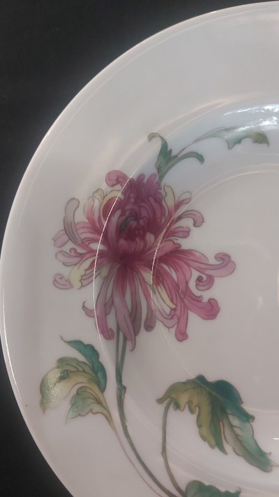 Quattro piatti in porcellana della casa Tharaud di Limoges