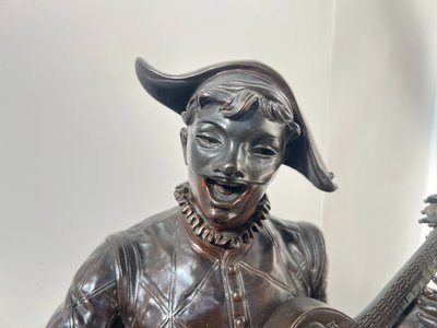 Il gruppo musicale Arlecchino in bronzo con patina marrone di DEBUT Marcel