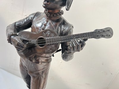 Il gruppo musicale Arlecchino in bronzo con patina marrone di DEBUT Marcel