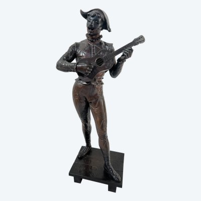 Il gruppo musicale Arlecchino in bronzo con patina marrone di DEBUT Marcel