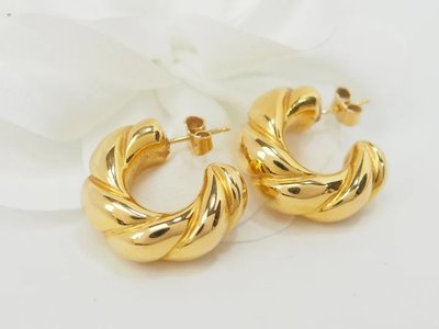 Boucles d'oreilles créoles torsadées en or jaune