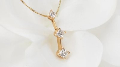 Collier trilogie en or jaune et diamants princesse