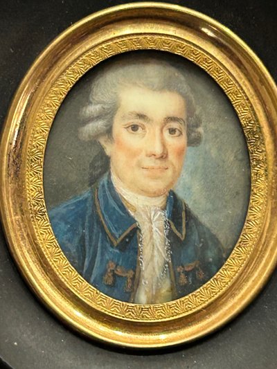 Miniature portrait of a man in a blue jacket from the late 18th century