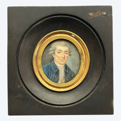 Miniature portrait of a man in a blue jacket from the late 18th century
