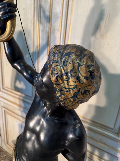 Pair of Nubian wooden torch holders from Venice, 19th century