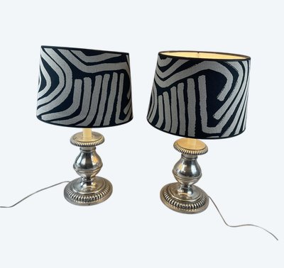 Pair of silver metal lamps