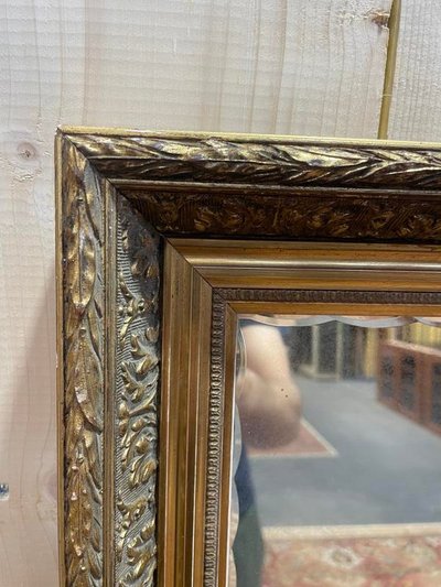 Miroir en bois doré de style Empire 