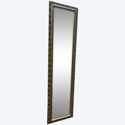Small mirror between two in gilded wood