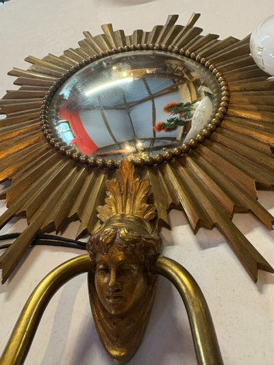WITCH MIRROR WALL LAMP IN THE SHAPE OF A SUN, WORK BY MAISON JANSENS