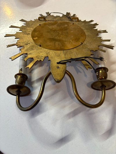 WITCH MIRROR WALL LAMP IN THE SHAPE OF A SUN, WORK BY MAISON JANSENS