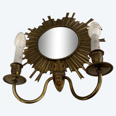 WITCH MIRROR WALL LAMP IN THE SHAPE OF A SUN, WORK BY MAISON JANSENS