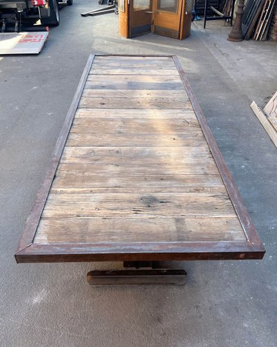 Table with oak top and cast iron base