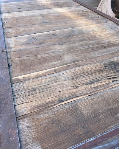 Table with oak top and cast iron base