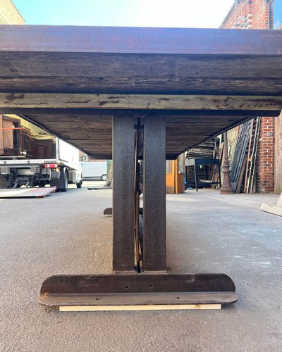 Table with oak top and cast iron base